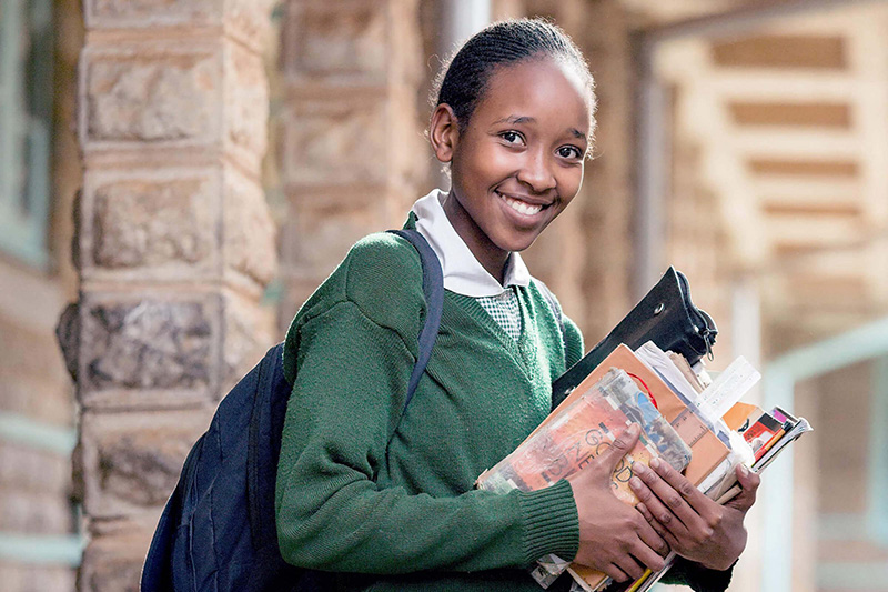 Student with school materials. Credit: GPE/Kelley Lynch